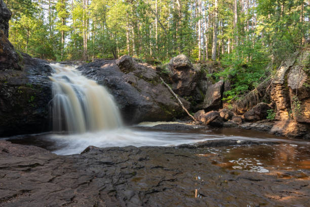 istock Upper Falls in the morning light.  Amnicon Falls state park, South Range, Wisconsin, USA. 2171210512