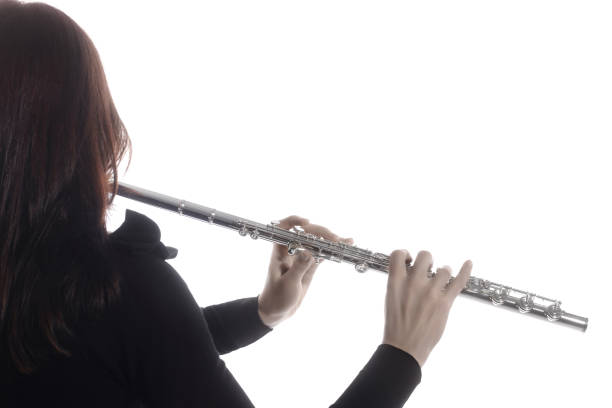 istock Flute music. Flutist hands flute instrument 2171212496