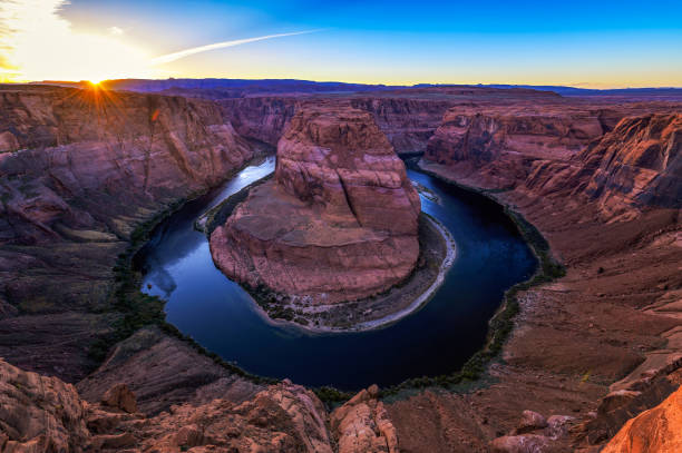 istock Sunset over Horseshoe Bend and Colorado river 2171213398