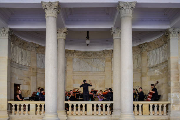 Karlovy Vary, Czech Republic - August 14 2024: KSO Karlovy Vary Symphony Orchestra Playing a Colonnade Concert at the Mill Colonnade or Mlynska Kolonada.