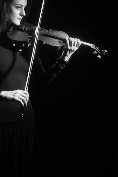 istock Violin player Violinist playing violin classical music instrument 2171215419