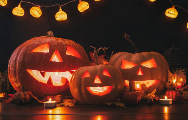Jack O’ Lanterns on The Old Wooden Background