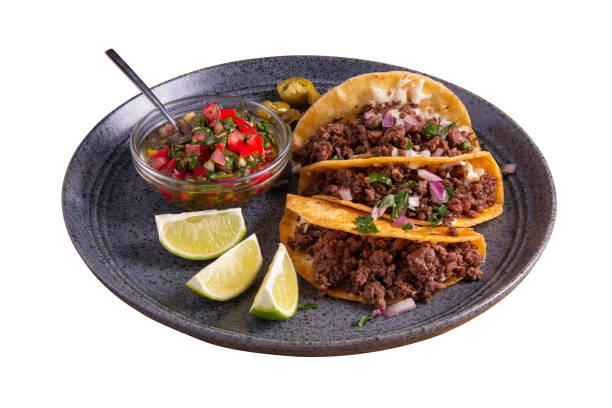 istock Delicious tacos filled with beef served on a plate. 2171234262