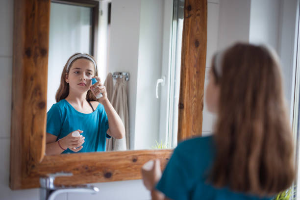 istock Happy young girl applying face serum 2171234903