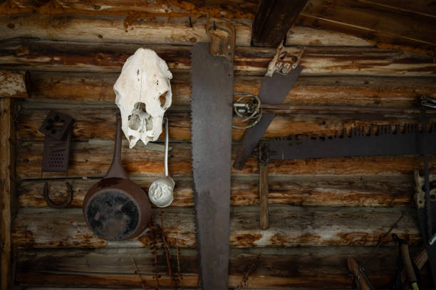 Detail view of hammers hanging inside a blacksmith workshop