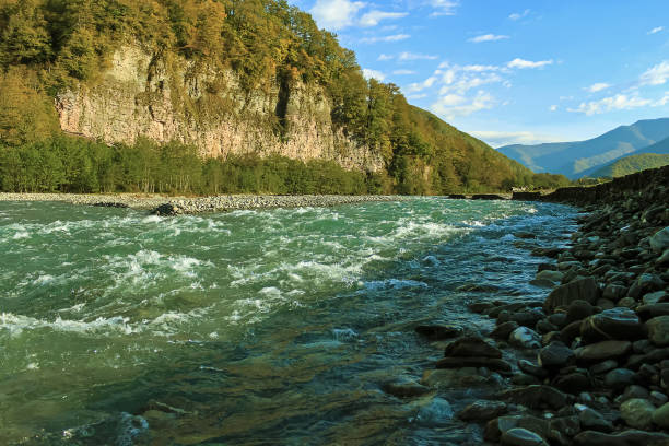 istock A beautiful mountain river on the background of steep cliffs 2171246204