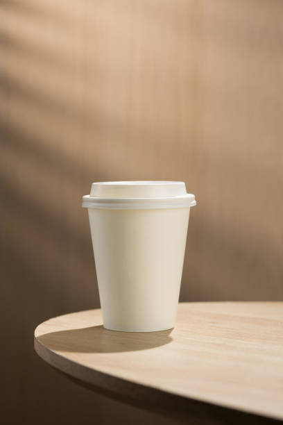 istock The solitary coffee cup on the wooden table. 2171246787