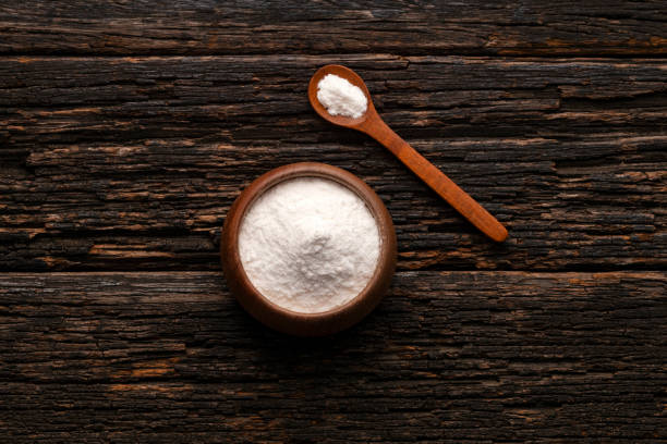 istock Baking soda in spoon and bowl - Healthy food. 2171246873