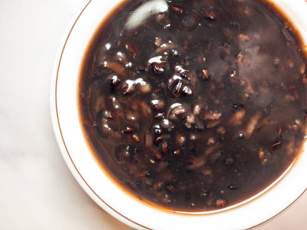 istock Fragrant and soft black rice porridge, a healthy breakfast option 2171248408