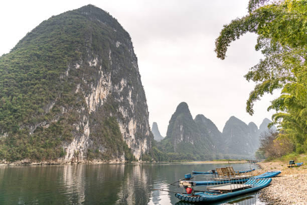 istock Beautiful Li river bamboo side Karst mountain landscape in Yangshuo, China 2171256257