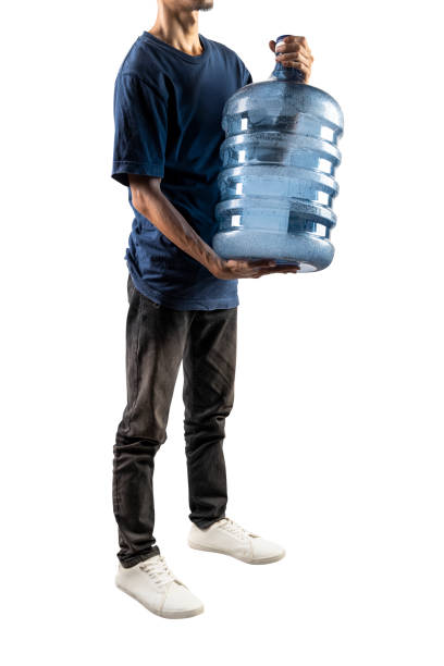 istock A man is holding a water gallon in his hands 2171260588