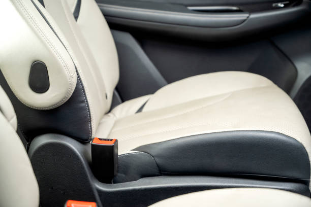 istock The back of a car seat is shown with a red button on the side 2171261421