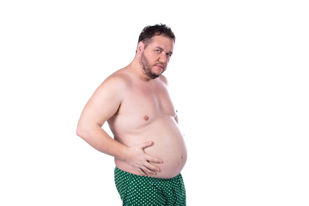 istock Funny fat man on a diet. Guy posing on a white background. 2171269978