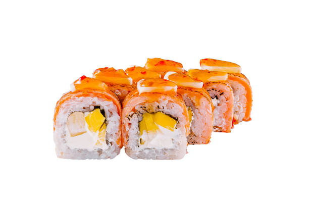 istock Sushi rolls with salmon, mango, cream cheese and sauce standing in line on white background 2171273828