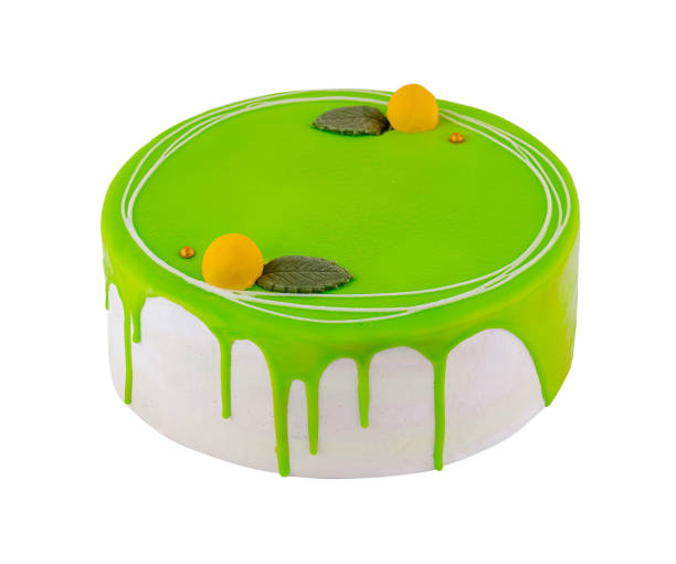 istock Delicious birthday cake covered with green icing on white background 2171274074