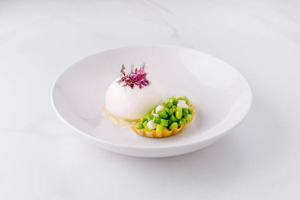 istock Gourmet appetizer with vegetables and creamy mousse on white plate 2171274218