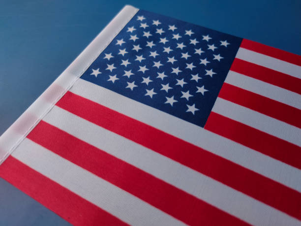 istock Closeup american flag on a blue background 2171277967