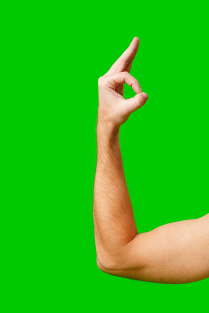 istock Hand Gesture Signifying Approval Against Bright Green Background 2171278835