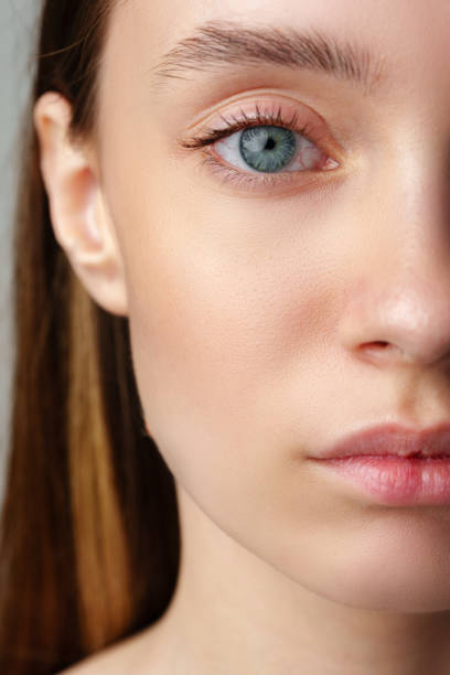 istock Close Up of Woman's Blue Eyes With Natural Makeup 2171281762