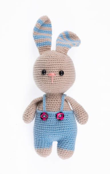 istock funny knitted toy rabbit isolated on white background 2171285675