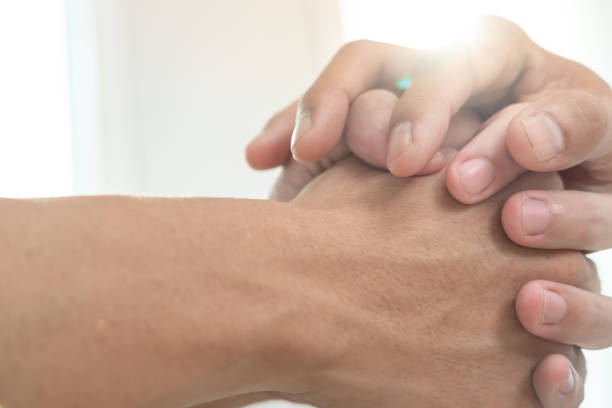 istock psychiatrist hold hand support each while discussing family issues. doctor encourages and empathy woman suffers depression. psychological, save divorce, Hand in hand together, trust, care 2171286092