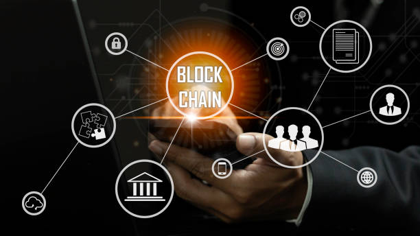 istock businessman touching a smart contract and executing a cryptocurrency transaction with blockchain technology. The transaction is secure and transparent, and there are other people in the background. 2171286916