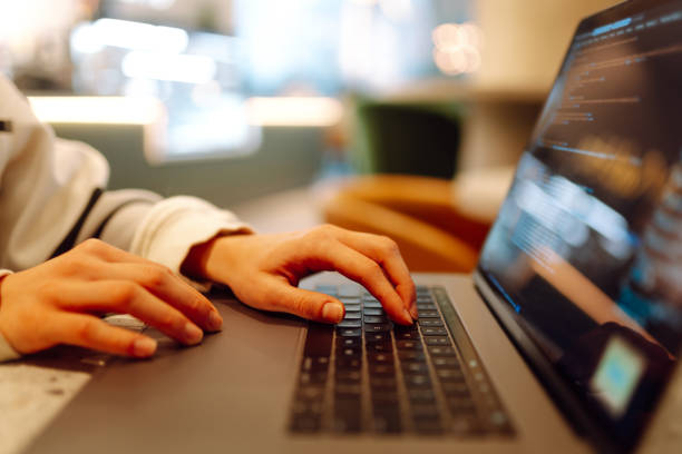 istock A young woman is engaged in typing on a laptop. 2171287058