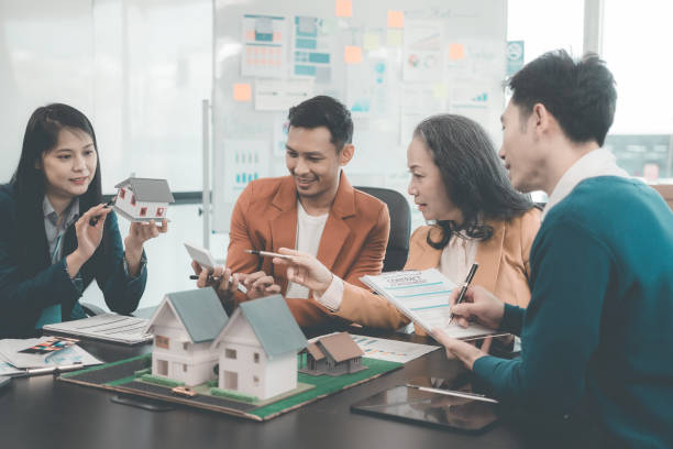 istock Home development concept, smart home, home automation system mockup with business people on blurred background in building design studio, architecture real estate project concept 2171287153