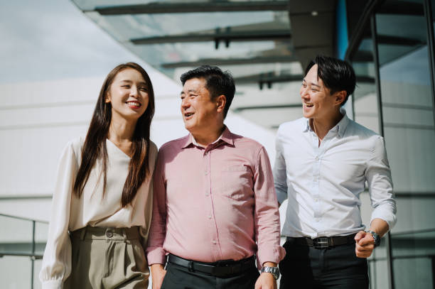 istock Three Asian Chinese people out for lunch. 2171287446