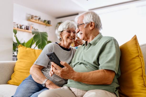 istock Joyful senior couple surfing the internet 2171296360