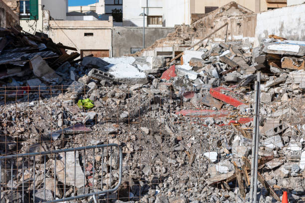 istock Pile of rubble surrounds debris and destruction 2171296465