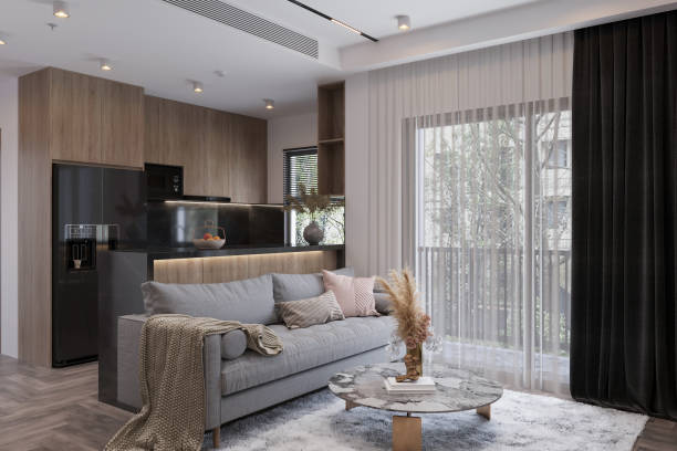 istock Modern living room interior with comfortable sofa, wooden coffee table, and large windows with city view. 2171306174