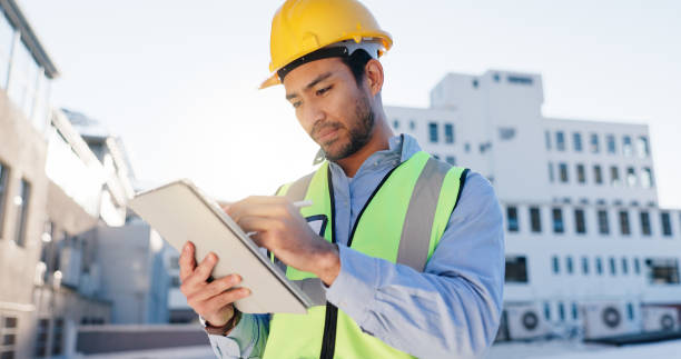 istock Tablet, planning and construction man on site with communication for contract city thinking. Digital technology, industry and civil engineer worker with blueprint notes for renovation approval 2171312867