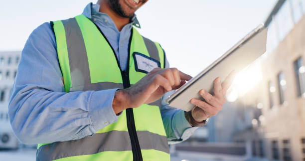 istock Person, hands or tablet on rooftop for construction planning, building maintenance or civil engineering. Contractor, man or tech for project management in city for infrastructure development feedback 2171312868