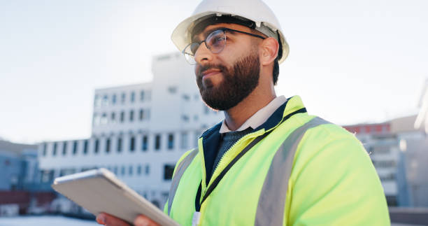 istock Tablet, planning and construction engineer on site with communication for contract city thinking. Digital technology, industry and civil worker man with blueprint notes for renovation approval 2171312872