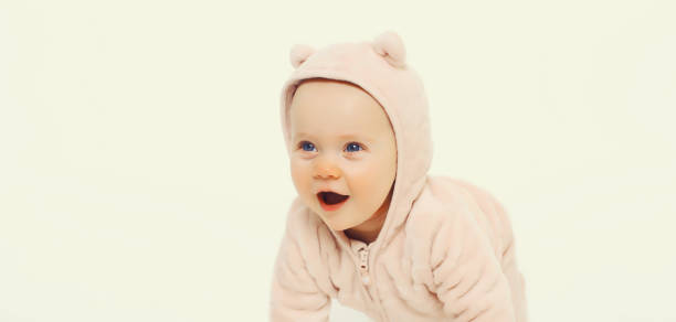 istock Happy cute baby crawling on the floor on white studio background 2171313095