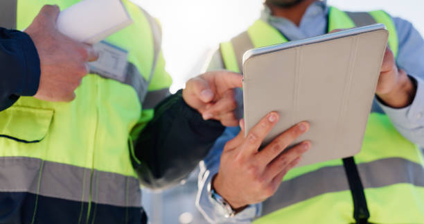 istock Business people, hands and architect with tablet for construction planning, project or building in city. Closeup, civil engineer or team with technology for industrial design or architecture together 2171314771
