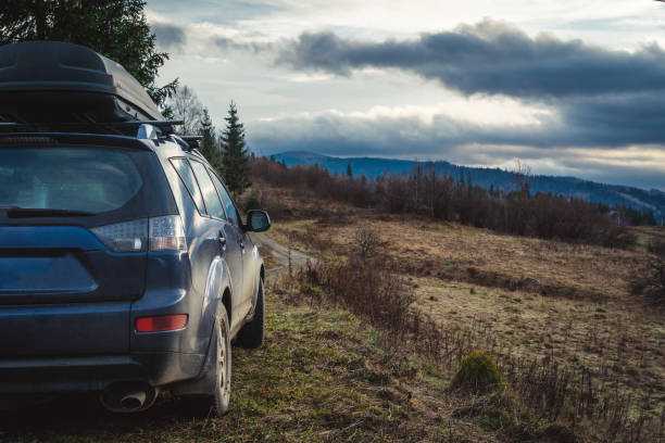 istock car for traveling with a mountain road 2171315451