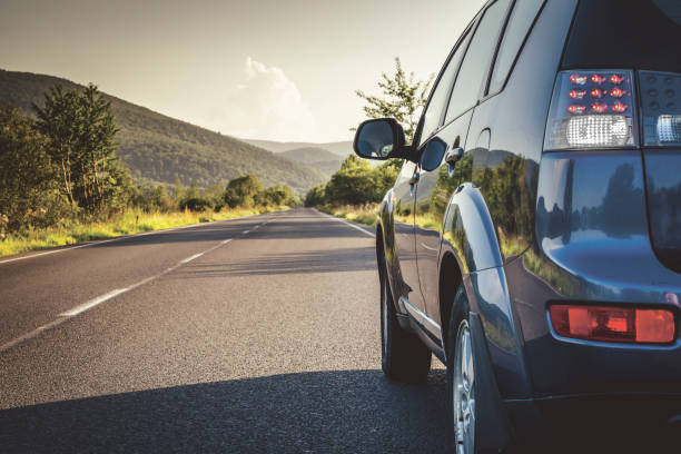 istock car for traveling with a mountain road 2171315499