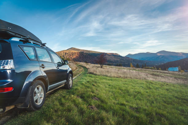 istock car for traveling with a mountain road 2171315546