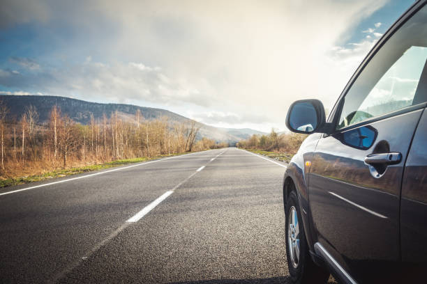 istock car for traveling with a mountain road 2171315647