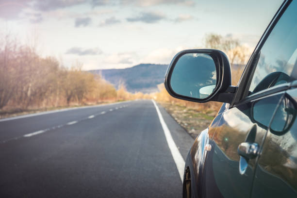 istock car for traveling with a mountain road 2171315653