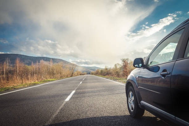 istock car for traveling with a mountain road 2171315660
