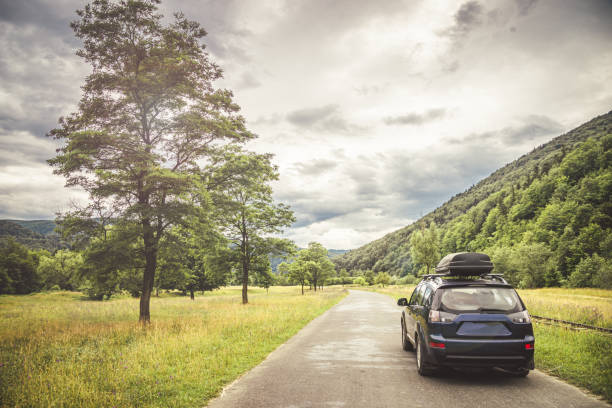 istock car for traveling with a mountain road 2171315675