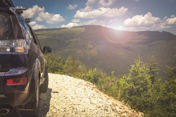 istock car for traveling with a mountain road 2171315704
