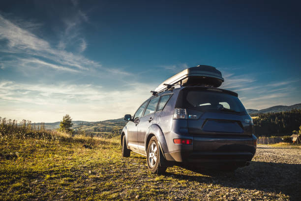 istock car for traveling with a mountain road 2171315718