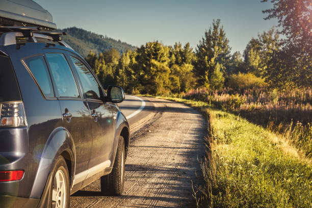 istock car for traveling with a mountain road 2171315727