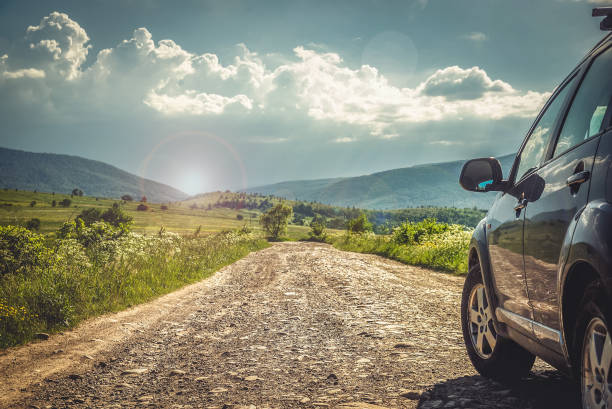 istock car for traveling with a mountain road 2171316023