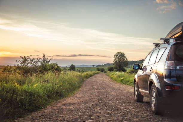 istock car for traveling with a mountain road 2171316066