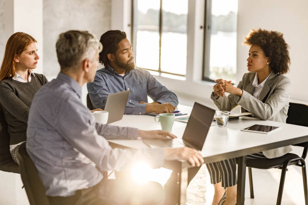 istock Business team talking on a meeting in the office. 2171319103